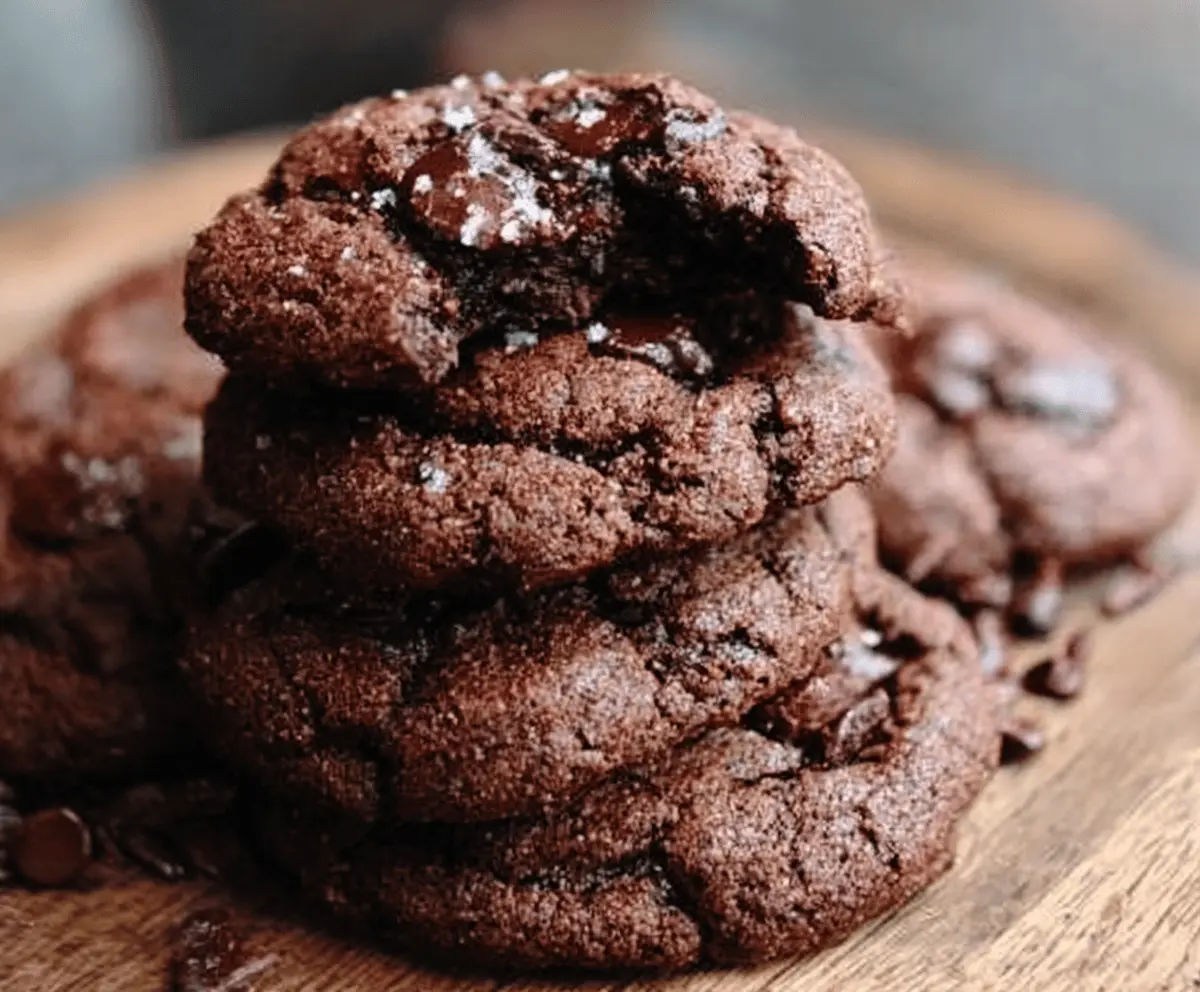 Delicious double chocolate chip cookies fresh out of the oven, featuring melted chocolate and gooey texture.