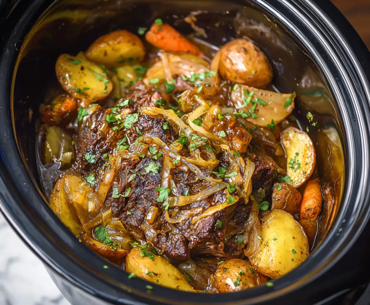 Savory Crockpot French Onion Pot Roast in a rustic setting, topped with melted cheese and caramelized onions.