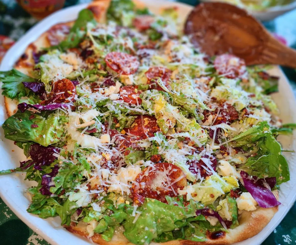 Colorful pizza night salad with fresh vegetables and cheese in a bowl for a delicious dinner idea