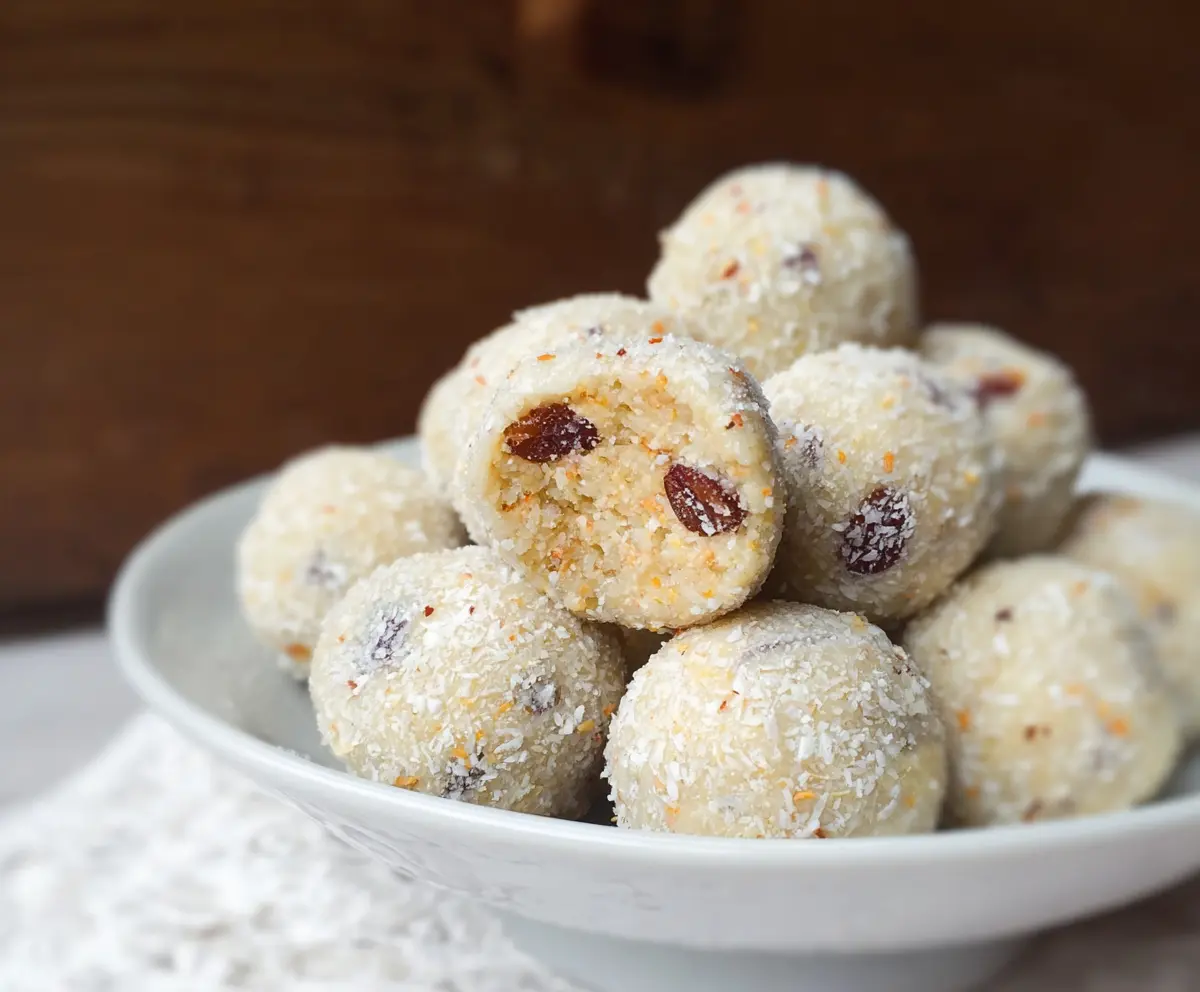 Healthy vanilla protein balls on a white plate, perfect for a quick nutritious snack.