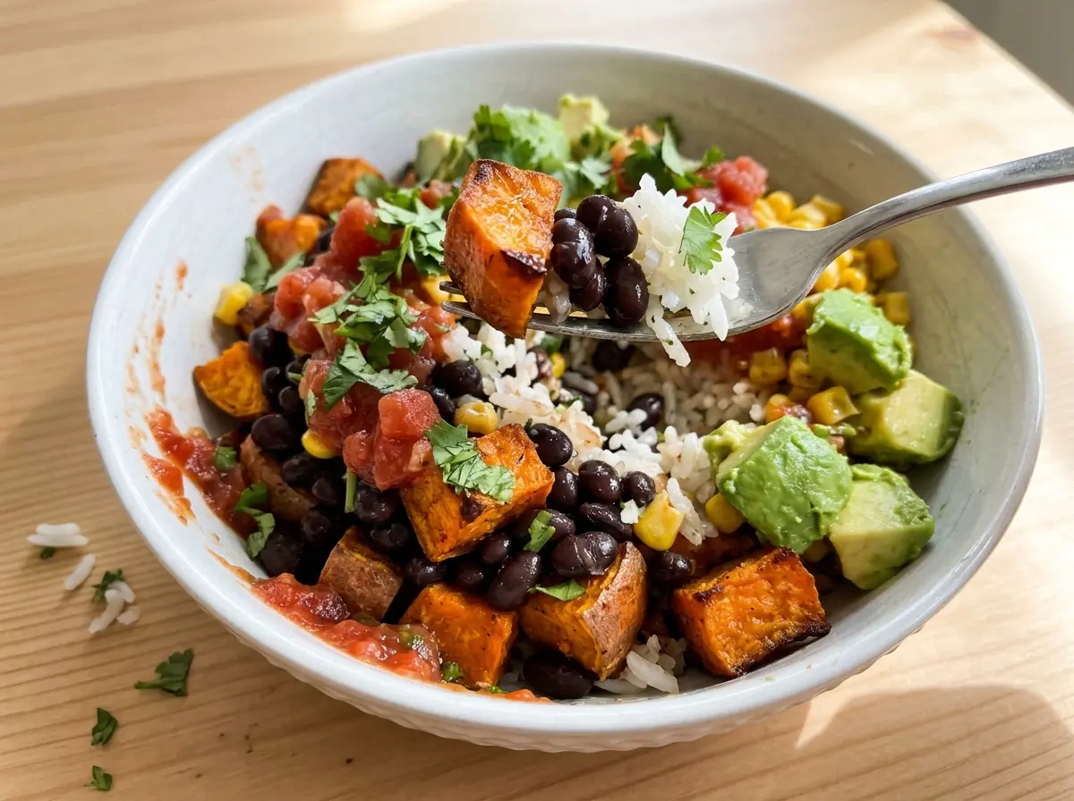 Black Bean Sweet Potato Burrito Bowls with roasted, colorful toppings